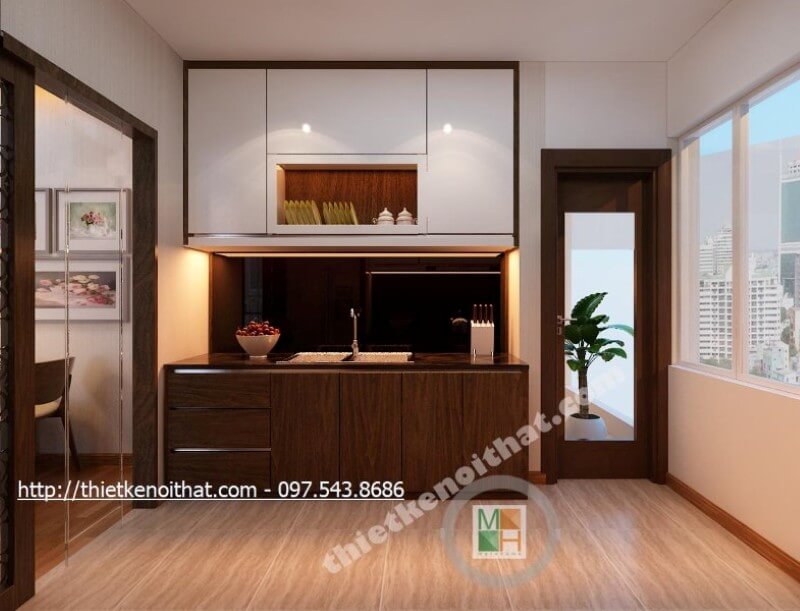 Hệ thống tủ bếp gỗ công nghiệp được thiết kế đơn giản, kết hợp 2 tone màu nâu trầm và trắng tạo hiệu ứng màu sắc mang đến cảm giác thư giãn và thanh thoát nhẹ nhàng. Tủ bếp gỗ công nghiệp