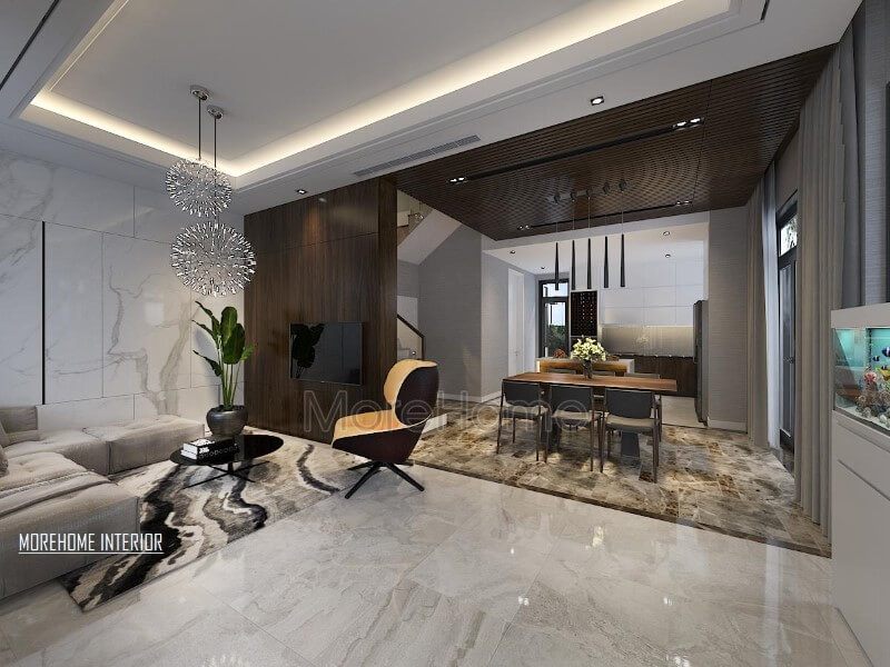 Điểm nhấn ấn tượng giữa gỗ ốp tường cùng đá lát sàn cao cấp tạo nên ánh nhìn hiện đại, độc đáo cho phòng khách liền bếp ăn.